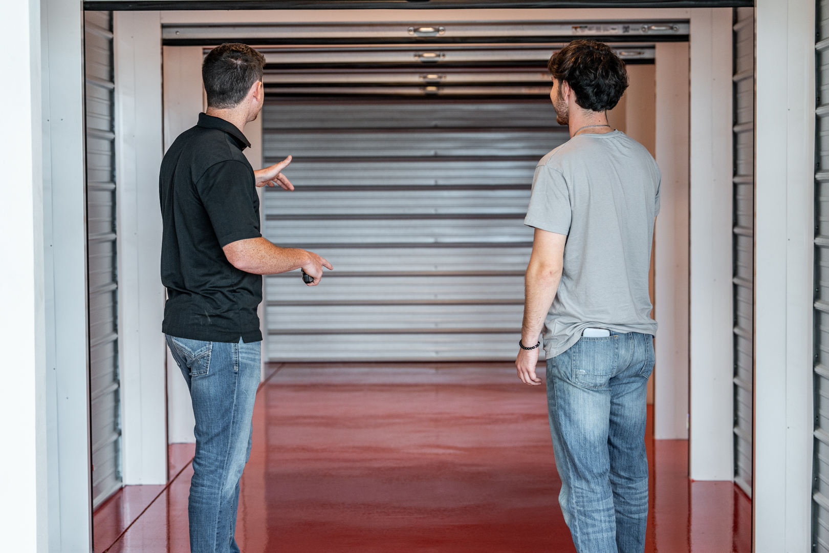 Modern Storage® team member giving a tour of a climate-controlled storage unit in Springdale